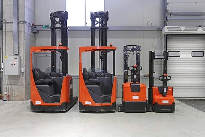 forklifts transporting goods in a commercial setting